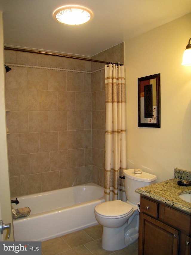 bathroom with shower / tub combo with curtain, vanity, toilet, and tile patterned floors