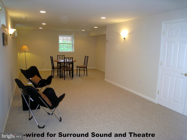 sitting room with baseboards, carpet, and recessed lighting