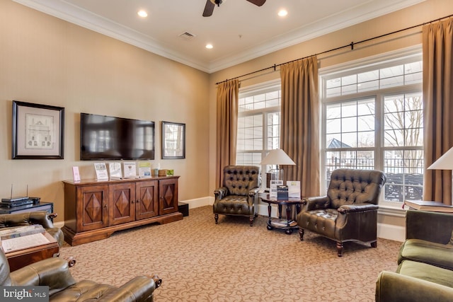 living area with baseboards, visible vents, carpet, crown molding, and recessed lighting