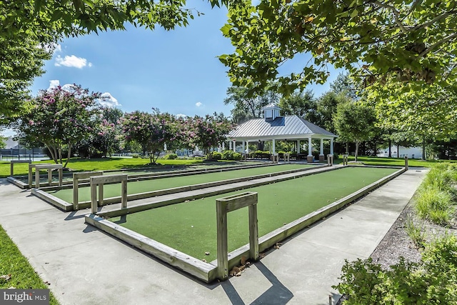 view of community with a lawn and a gazebo