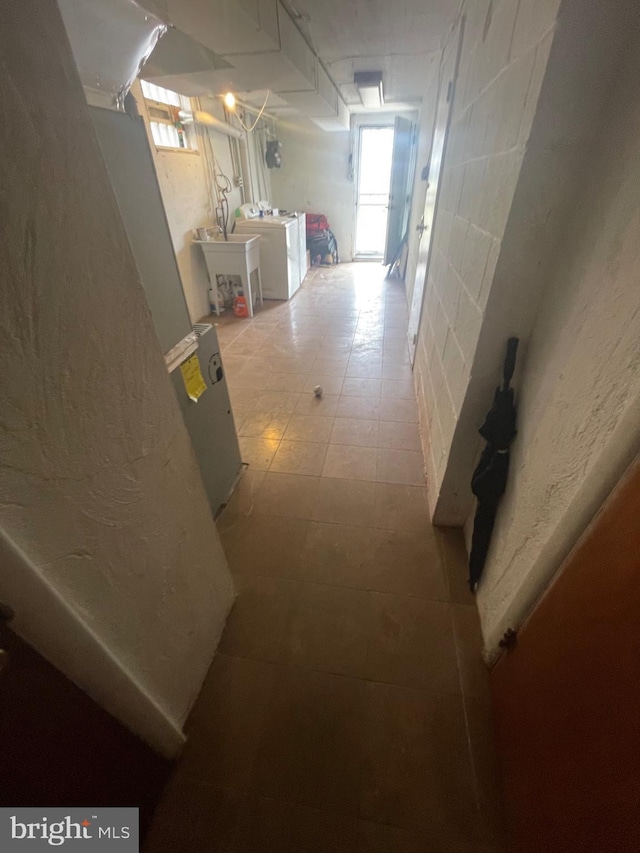 hall with washer and dryer