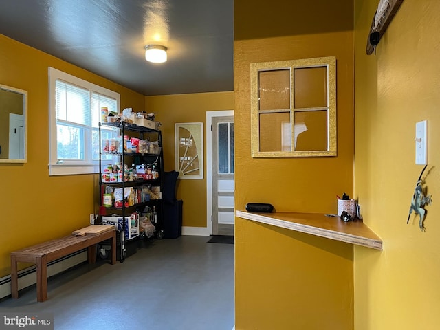 interior space featuring concrete flooring