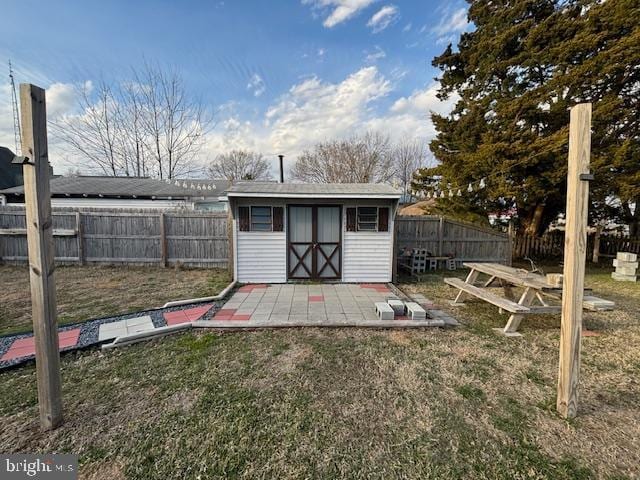 view of shed featuring a fenced backyard