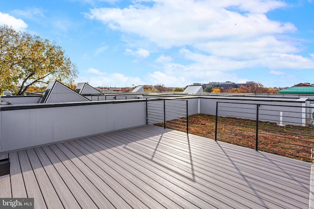 wooden deck featuring a city view