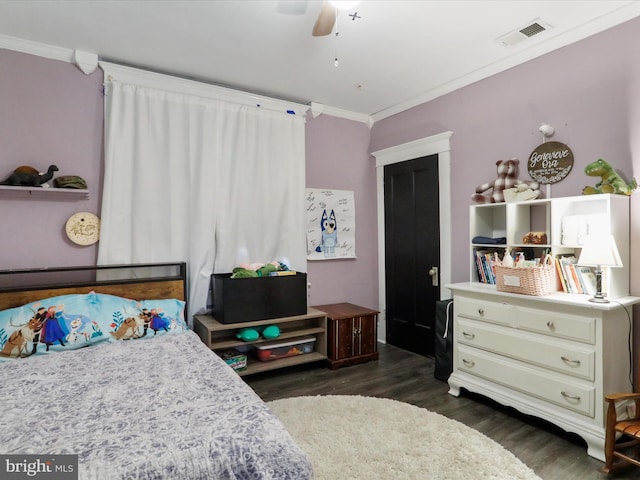 bedroom featuring ornamental molding, visible vents, ceiling fan, and dark wood-style floors