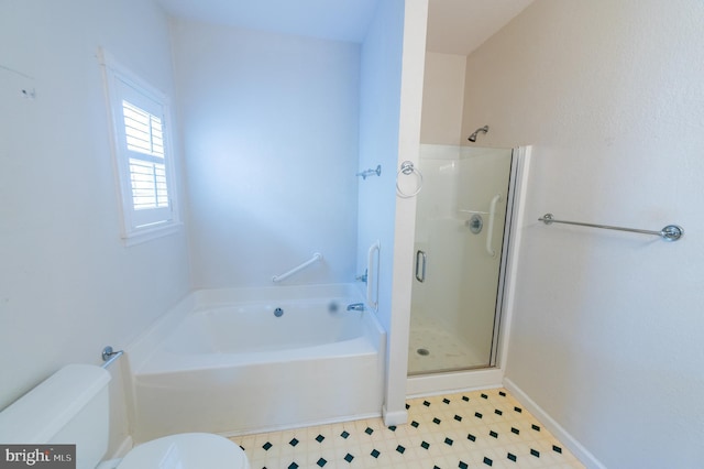 full bath with toilet, a stall shower, baseboards, and a garden tub