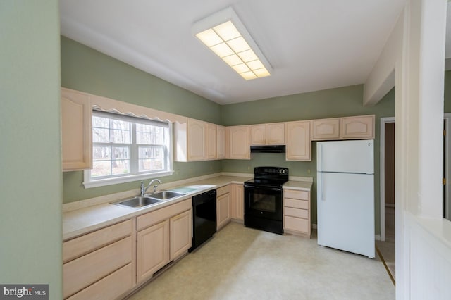 kitchen featuring light brown cabinets, black appliances, a sink, and under cabinet range hood