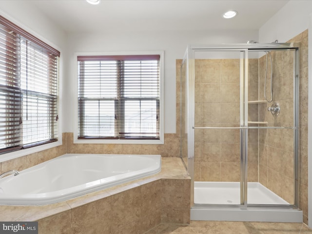 full bathroom with a garden tub, a shower stall, tile patterned floors, and recessed lighting