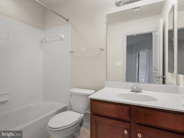 bathroom featuring tile patterned floors, vanity, toilet, and shower / bathtub combination