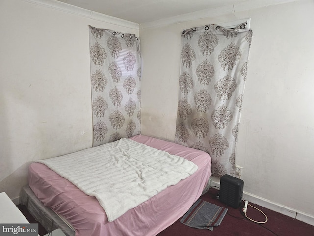 bedroom featuring crown molding