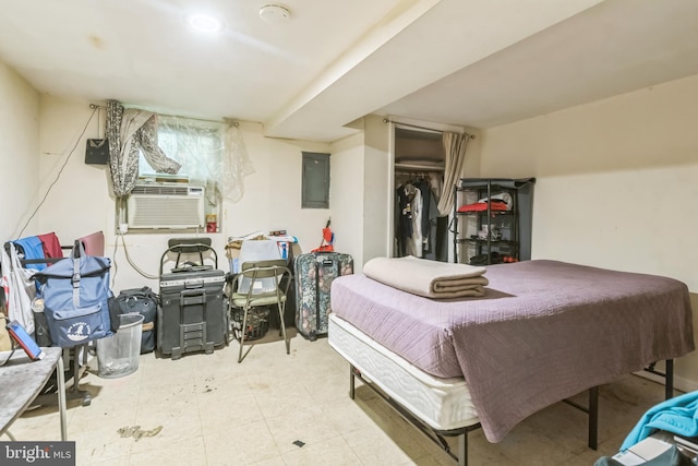 bedroom featuring electric panel and cooling unit