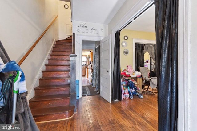 stairs with wood-type flooring