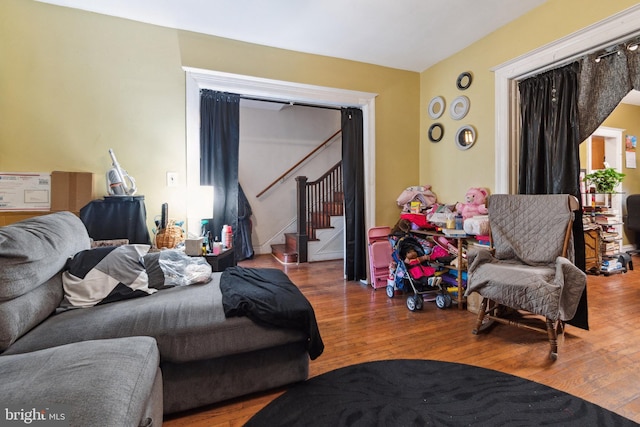 bedroom with hardwood / wood-style floors