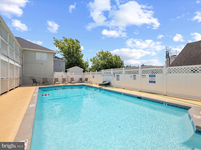 community pool with fence