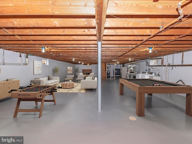 recreation room with finished concrete floors and pool table