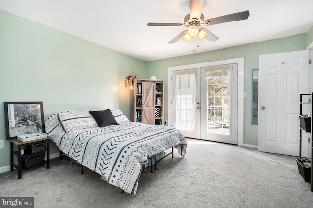 bedroom with access to exterior, baseboards, carpet flooring, and french doors