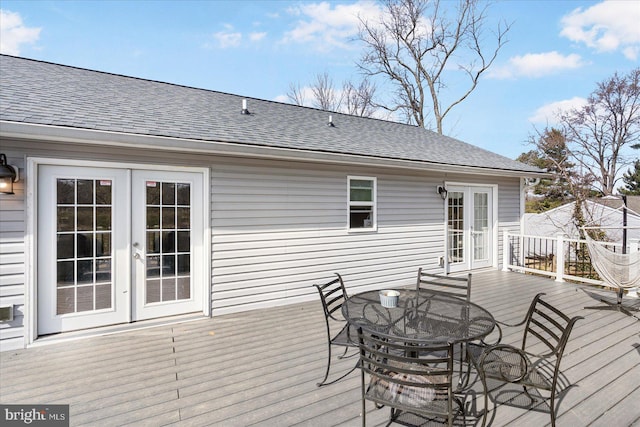 wooden terrace featuring french doors