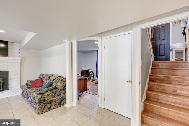 interior space featuring light tile patterned floors and stairway