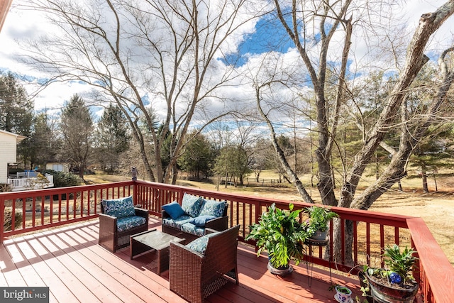 wooden deck with an outdoor hangout area