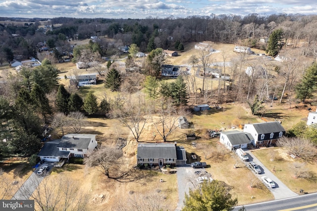 drone / aerial view with a forest view