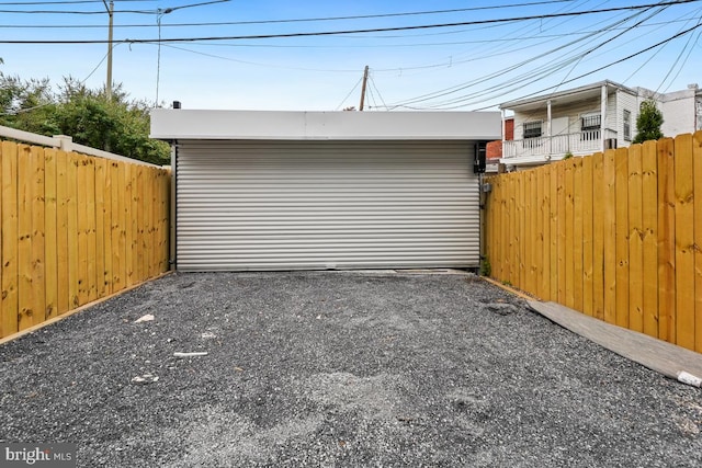 garage featuring fence