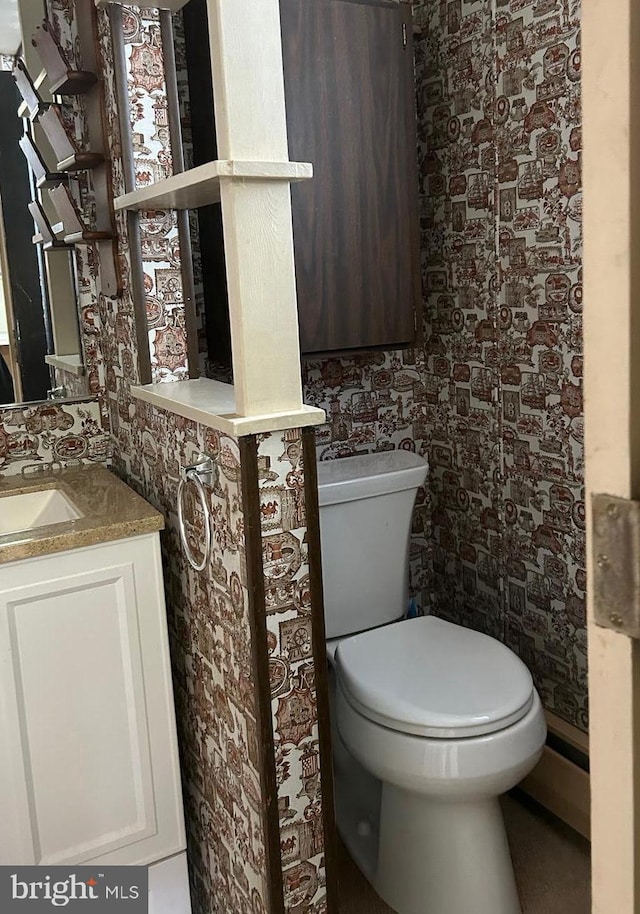 half bath with toilet and vanity