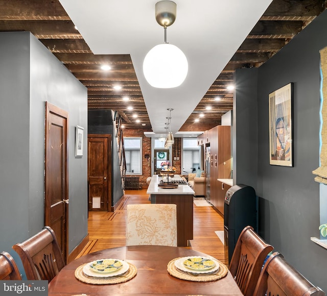 dining room featuring light wood-style floors