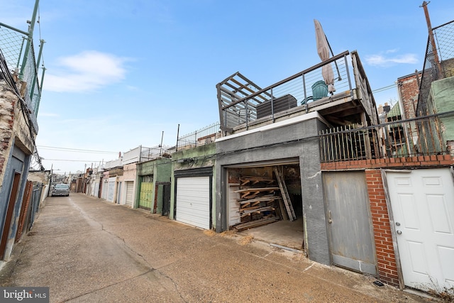 garage with fence