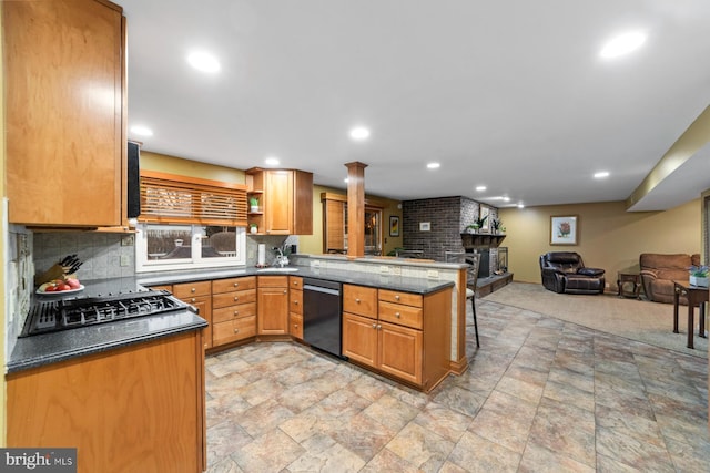 kitchen featuring dishwashing machine, open floor plan, a peninsula, a fireplace, and gas cooktop