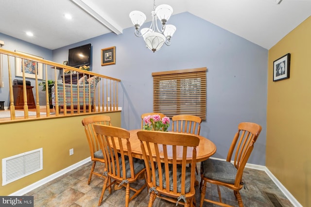 dining space with baseboards, lofted ceiling, visible vents, and an inviting chandelier