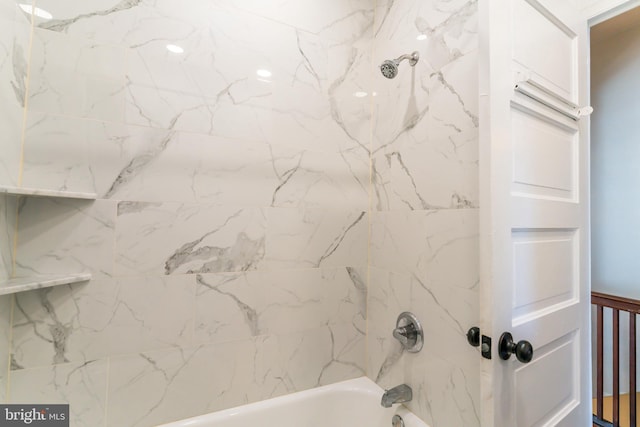 full bath featuring tub / shower combination