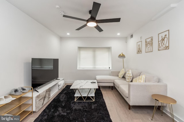 living room with ceiling fan, wood finished floors, visible vents, and recessed lighting