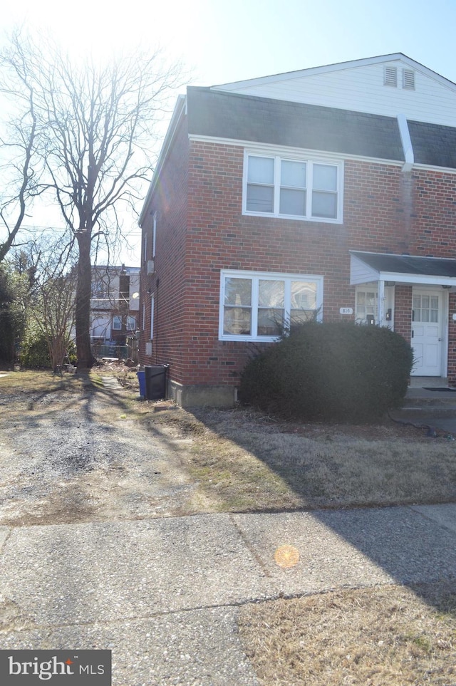 view of front of property with brick siding