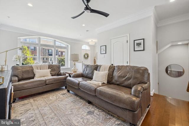 living room with ceiling fan, light wood finished floors, recessed lighting, and crown molding