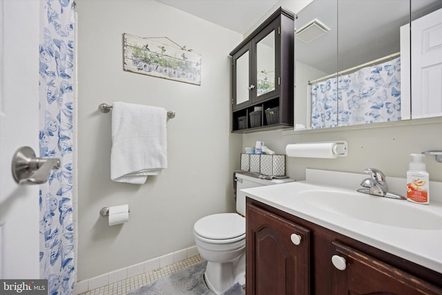 bathroom featuring baseboards, toilet, tile patterned floors, curtained shower, and vanity