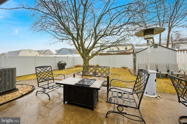 view of patio with central AC, a fenced backyard, and an outdoor living space