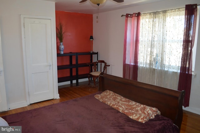 bedroom featuring wood finished floors