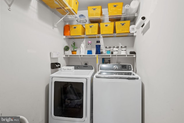 clothes washing area featuring laundry area and independent washer and dryer