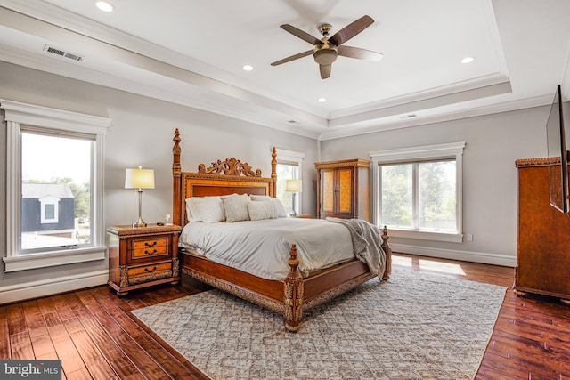 856 N Harrison St, Arlington, VA 22205 - bedroom with crown molding, dark wood finished floors, baseboards, a tray ceiling, and visible vents