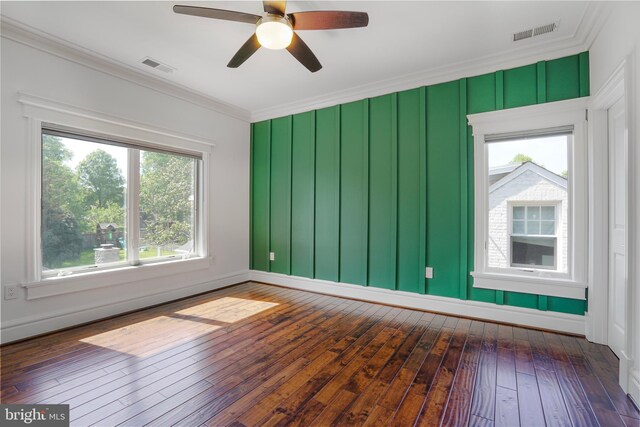 856 N Harrison St, Arlington, VA 22205 - unfurnished room with crown molding, baseboards, dark wood-style flooring, and visible vents
