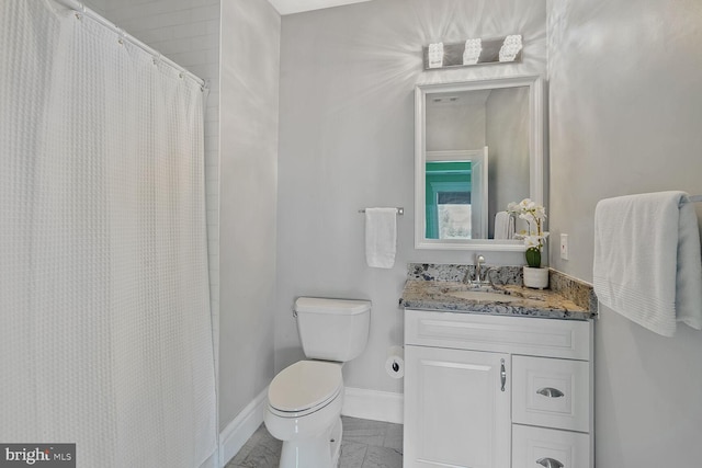 856 N Harrison St, Arlington, VA 22205 - bathroom featuring toilet, baseboards, a shower with curtain, and vanity