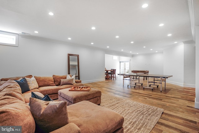 856 N Harrison St, Arlington, VA 22205 - living area with crown molding, recessed lighting, baseboards, and plenty of natural light