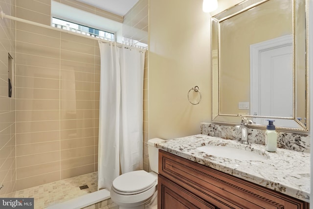 856 N Harrison St, Arlington, VA 22205 - bathroom with vanity, toilet, and tiled shower