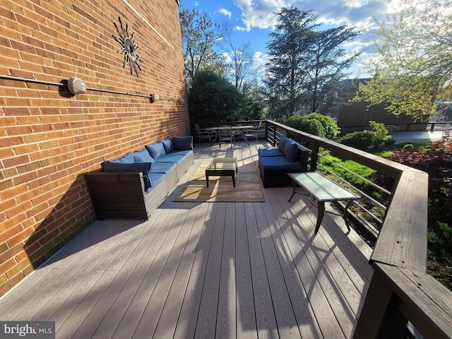 deck featuring outdoor lounge area