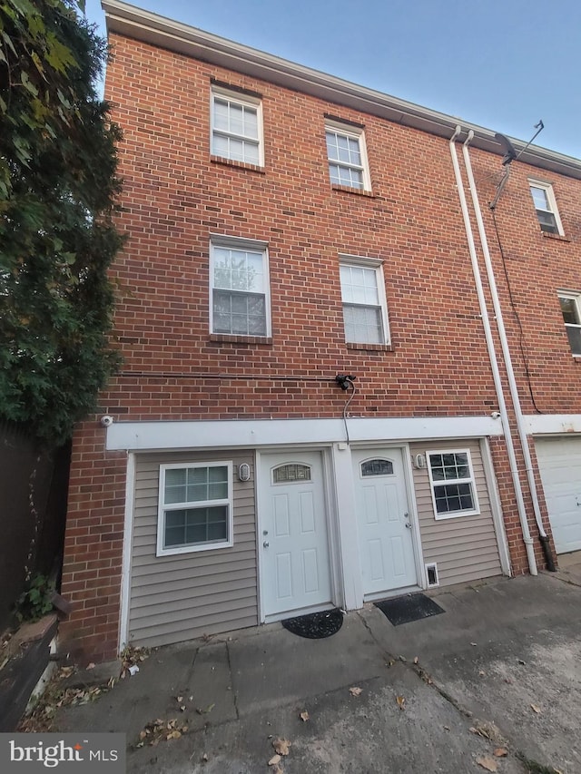 view of front of property with brick siding