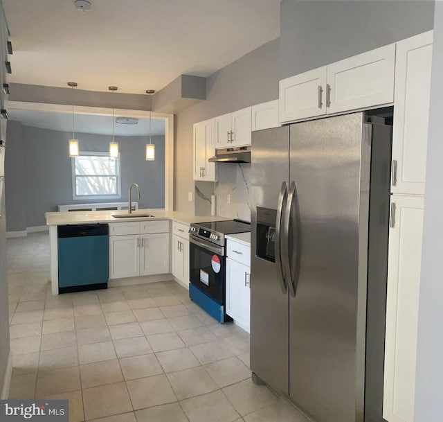 kitchen with under cabinet range hood, a peninsula, a sink, white cabinets, and appliances with stainless steel finishes