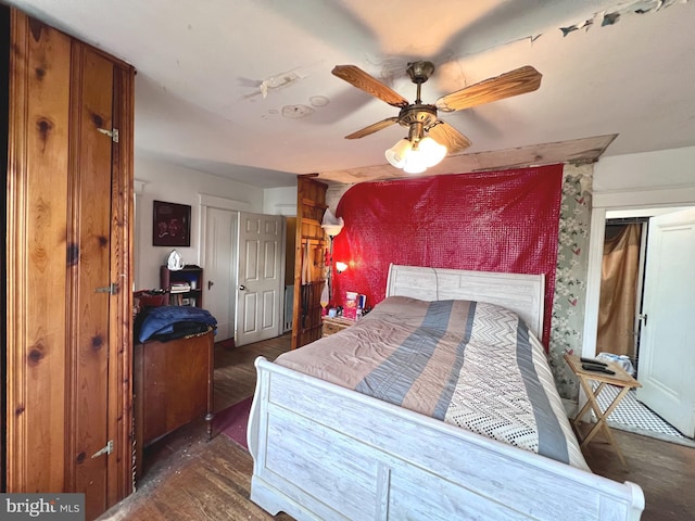 bedroom with ceiling fan and wood finished floors