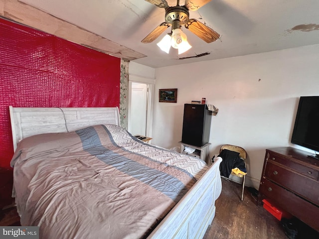 bedroom featuring ceiling fan and wood finished floors