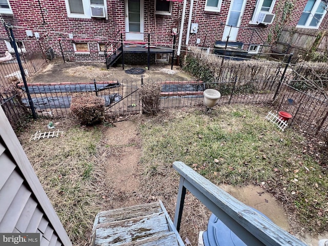 view of yard with a patio area, fence, and cooling unit