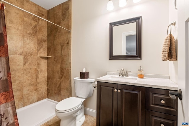 full bath with toilet, a tile shower, vanity, baseboards, and tile patterned floors